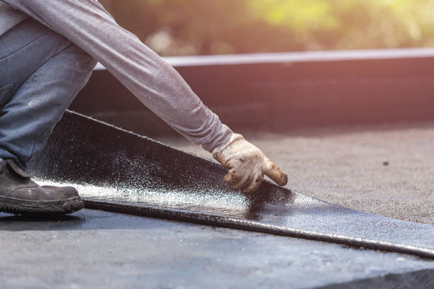 Professional Exterior Waterproofing technician working in Tustin, MI